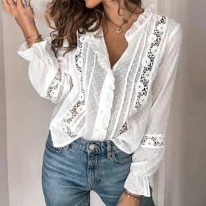 Chemise blanche à col montant et à manches longues en coton à boutonnage simple. Chemise de couleur unie pour femmes