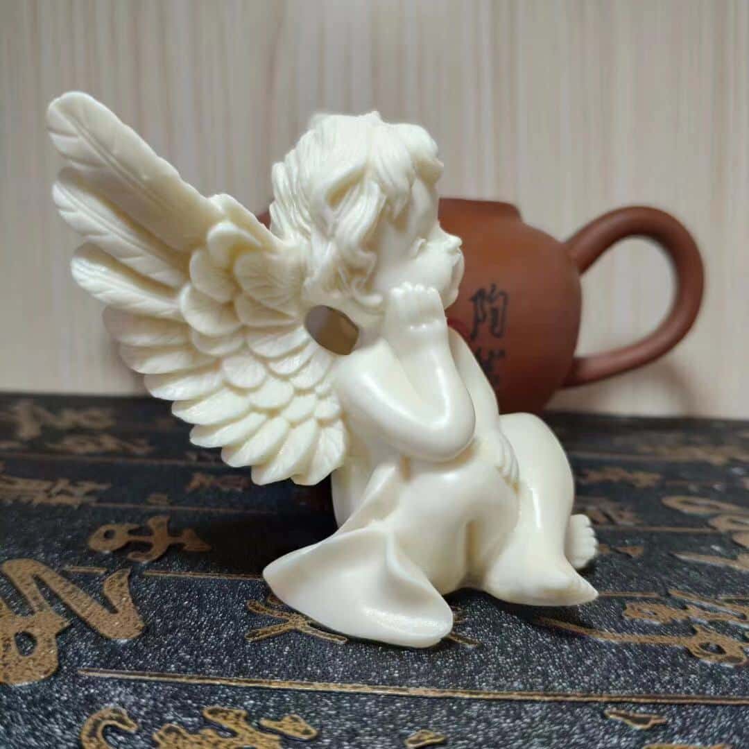 Sculpture d'ange en ivoire. Ornement décoratif d'intérieur – Image 7