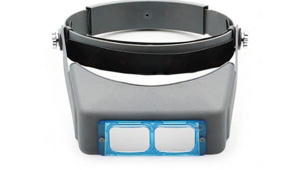 Porte-loupe. Loupe montée sur la tête à fort grossissement