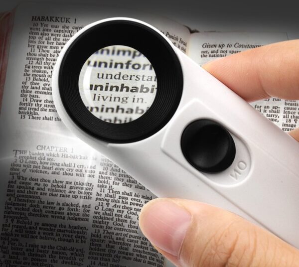 Loupe à main à doubles lumières pour l'évaluation des bijoux