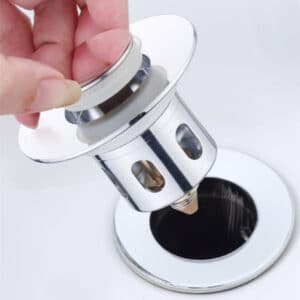 Noyau rebondissant de type poussoir en acier inoxydable pour égouttoir de lavabo