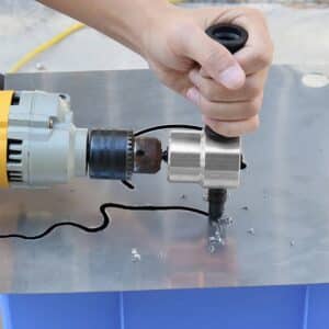 Coupe-tôle à double têtes