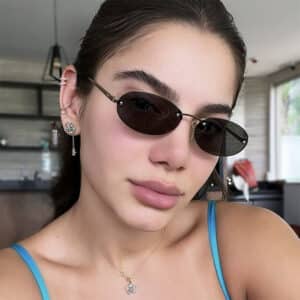 Lunettes de soleil à rivet ovale sans cadre en métal à la mode pour femmes