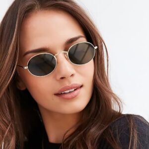 Lunettes de soleil ovales à la mode pour femmes. Lunettes à montures rondes en métal de marque de luxe