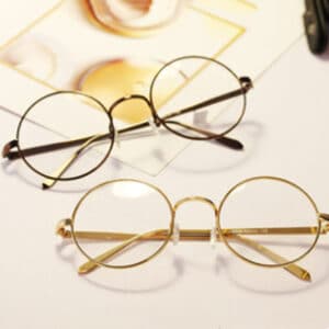 Lunettes de myopie à monture en métal rond clair et à cadre plat rétro pour dames