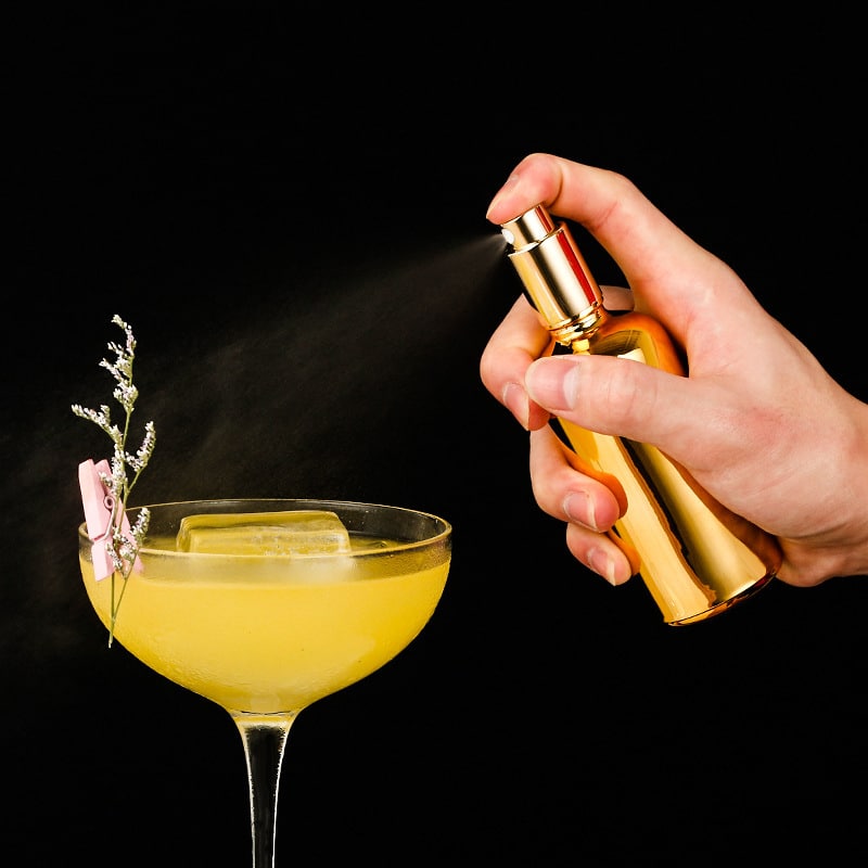 Flacon vaporisateur de parfum en verre transparent