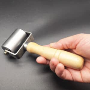 Rouleau de presse pour le cuir