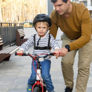 Harnais d'apprentissage pour enfant à vélo. Ceinture de sécurité anti-chute ajustable pour enfant à vélo